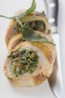 Chicken roulade with spinach filling — Stock Photo