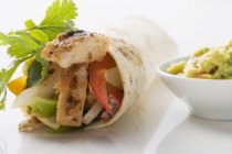 Wrap with chicken and peppers — Stock Photo