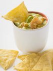 Vegetable dip with nachos — Stock Photo
