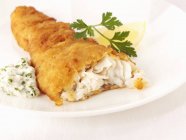 Breaded haddock with dip — Stock Photo