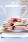 Various macaroons on plate — Stock Photo