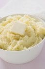 Purê de batata com botão de manteiga — Fotografia de Stock