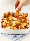 Potato wedges with cheese — Stock Photo