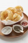 Onion rings with salt — Stock Photo