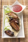 Glazed pork ribs with chilli sauce — Stock Photo