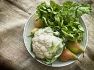Cauliflower with pears and salad — Stock Photo