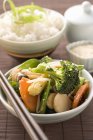 Vegetables with sesame seeds and rice — Stock Photo