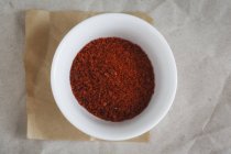 Bol de flocons de paprika — Photo de stock