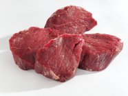Raw slices of beef fillet — Stock Photo