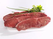 Four sirloin steaks — Stock Photo