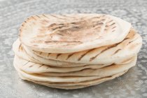 Stack of grilled flatbreads — Stock Photo