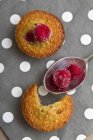 Close up of Financiers with raspberries — Stock Photo