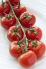 Tomates de videira frescos — Fotografia de Stock