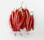 Chillies in plastic tray — Stock Photo