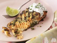 Salmon fillet with herbs sauce — Stock Photo