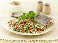 Trout with tabbouleh and watercress — Stock Photo