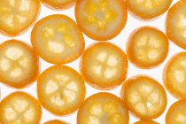 Molte fette di kumquat — Foto stock