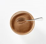 Cacao en polvo en tazón - foto de stock