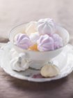 Various coloured meringues in a cup — Stock Photo