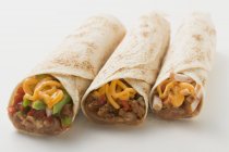 Tre burrito diversi — Foto stock