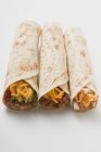 Tre burrito diversi — Foto stock