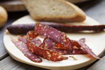 Supper with venison salami — Stock Photo