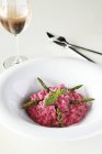 Risotto with beetroot and asparagus — Stock Photo