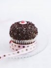 Cupcake decorated with butter cream — Stock Photo