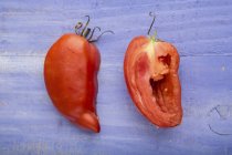Halved Adenhorn tomatoes — Stock Photo