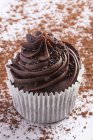 Chocolate cupcake in paper case — Stock Photo