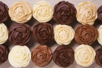 Cupcakes with brown frosting — Stock Photo