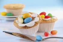 Cupcakes decorated with sugar eggs — Stock Photo
