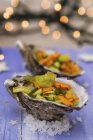 Oysters filled with vegetables — Stock Photo