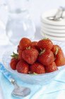 Strawberries in glass bowl — Stock Photo
