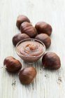 Chestnut cream and chestnuts — Stock Photo