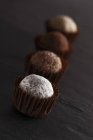 Row of truffle pralines — Stock Photo