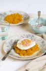 Carrot puree with fried egg — Stock Photo