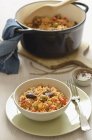 Rice stew with olives and peppers — Stock Photo