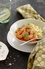 Prawns in tomato sauce with rice — Stock Photo