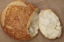Closeup view of sourdough bread broken loaf — Stock Photo