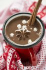 Cup of hot chocolate with star anise — Stock Photo