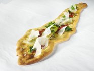 Flat bread with vegetables — Stock Photo