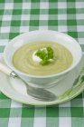 Celery soup with creme fraiche — Stock Photo