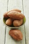 Sweet potatoes in bowl — Stock Photo