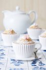 Muffins baked in silicon teacups — Stock Photo
