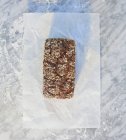 Pão coberto com aveia e sementes de girassol — Fotografia de Stock