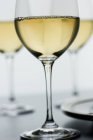 Closeup view of Chardonnay wine in stemmed glasses — Stock Photo