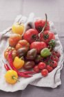 Assortment of tomatoes and chillies — Stock Photo