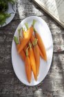 Peeled baby carrots — Stock Photo