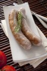 Fried butifarra fresh pork sausages — Stock Photo